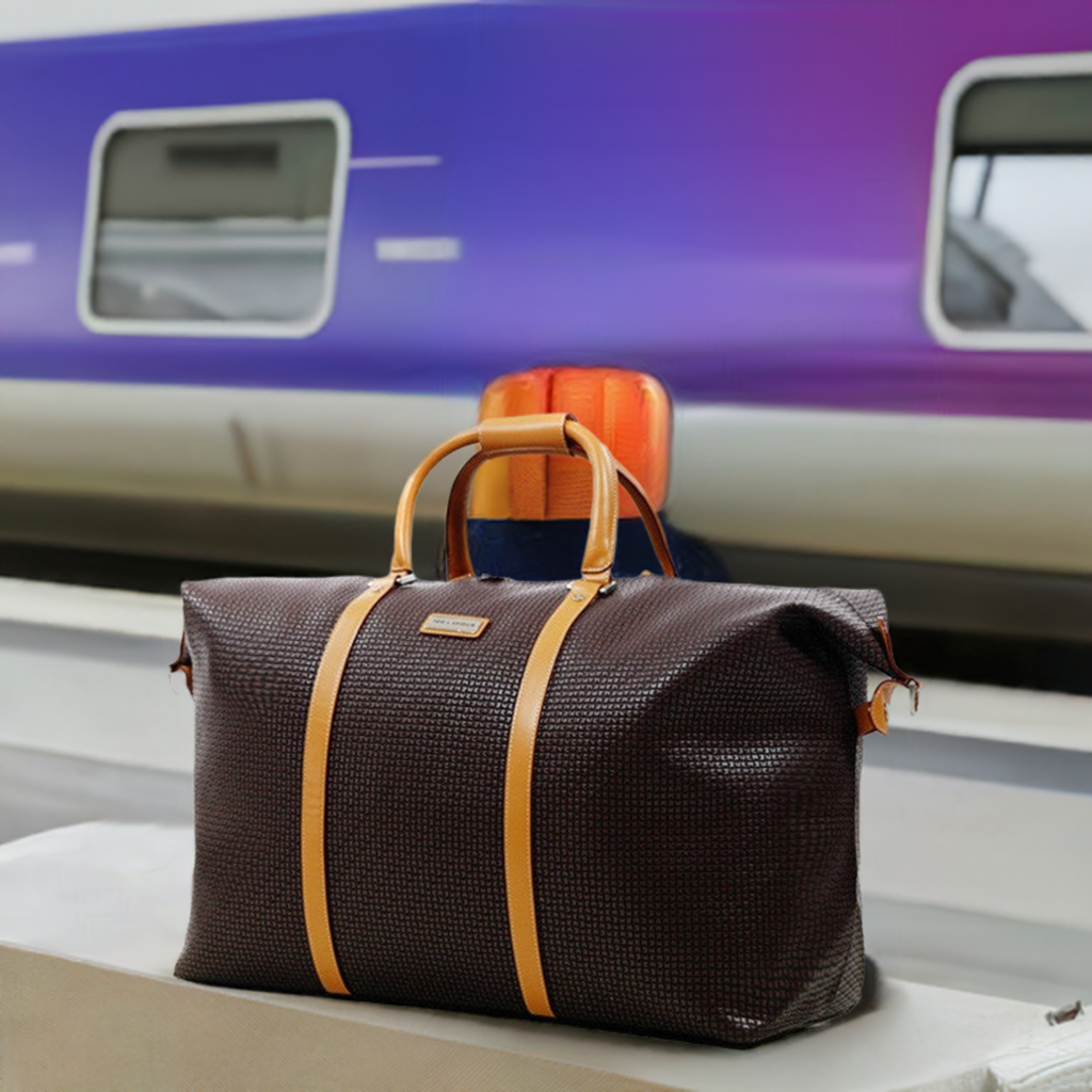 Le sac de voyage Fidelio by Ted Lapidus en cuir qui allie élégance et fonctionnalité, , Sac à Elle, Sac, BAGAGE, TED LAPIDUS JACQUES ESTEREL, STEVE MADDEN