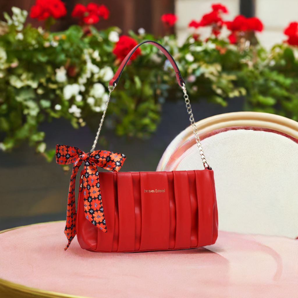 Le sac Maty rouge : une déclaration d'amour&nbsp;

Offrez à votre moitié un cadeau aussi élégant que romantique avec le sac Maty rouge de Jacques Esterel. Ce petit bijou de maroquinerie, aux lignes pures et à la couleur passionnée, est le cadeau idéal pour célébrer votre amour.

Pourquoi ce sac est le cadeau parfait pour la Saint-Valentin ?

Une couleur symbolique: Le rouge est la couleur de l'amour et de la passion. Ce sac est donc un choix évident pour exprimer vos sentiments.
Un design intemporel: Le sac